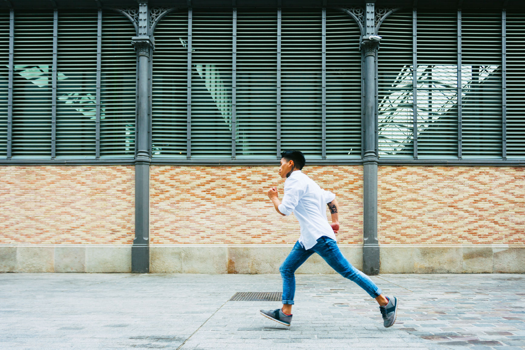 Stocksy_Man_Running