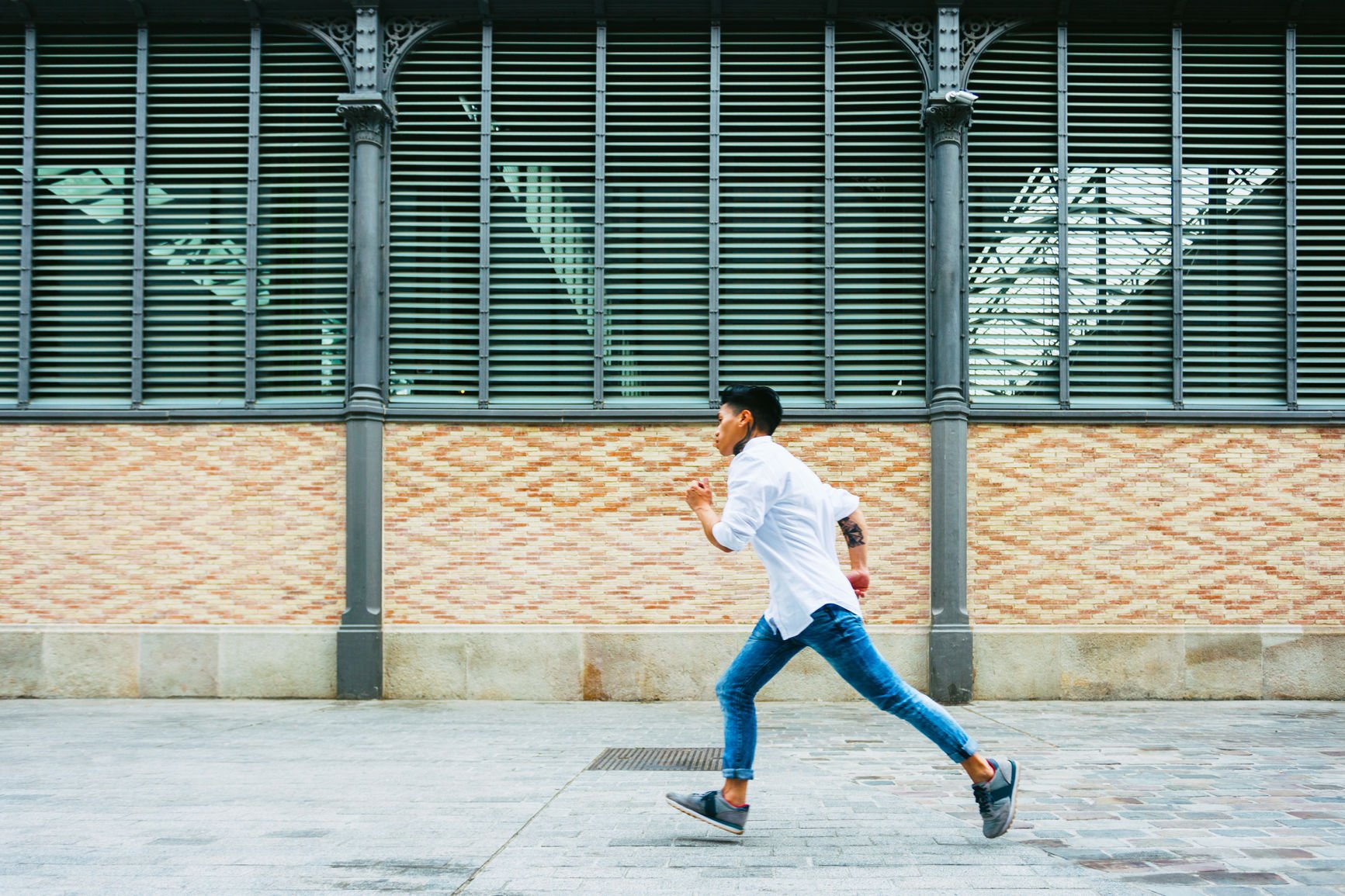 Stocksy_Man_Running